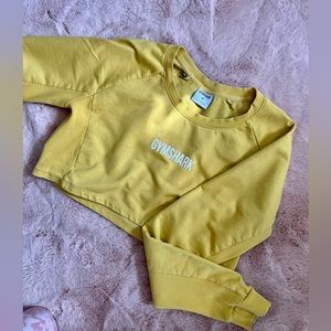 GYMSHARK Yellow Crop Sweater, Ribbed Detailing on sides and arms. Size M